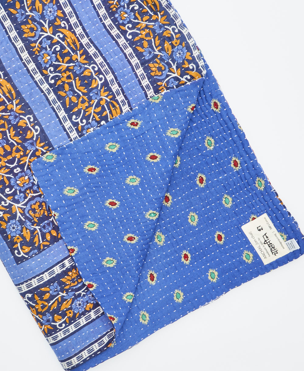Kantha quilt throw featuring traditional kantha hand stitching