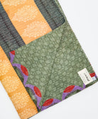 Kantha quilt throw featuring traditional kantha hand stitching