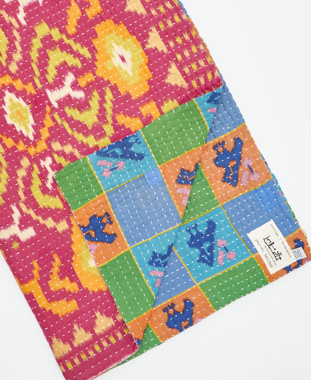 Kantha quilt throw featuring traditional kantha hand stitching
