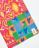 Kantha quilt throw featuring traditional kantha hand stitching