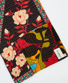 Kantha quilt throw featuring traditional kantha hand stitching