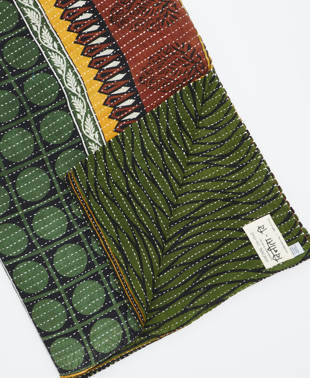 Kantha quilt throw featuring traditional kantha hand stitching
