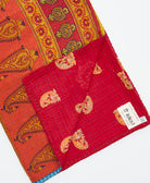 Kantha quilt throw featuring traditional kantha hand stitching