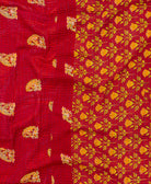 kantha quilt throw with a tag featuring the hand-stitched signature of the maker