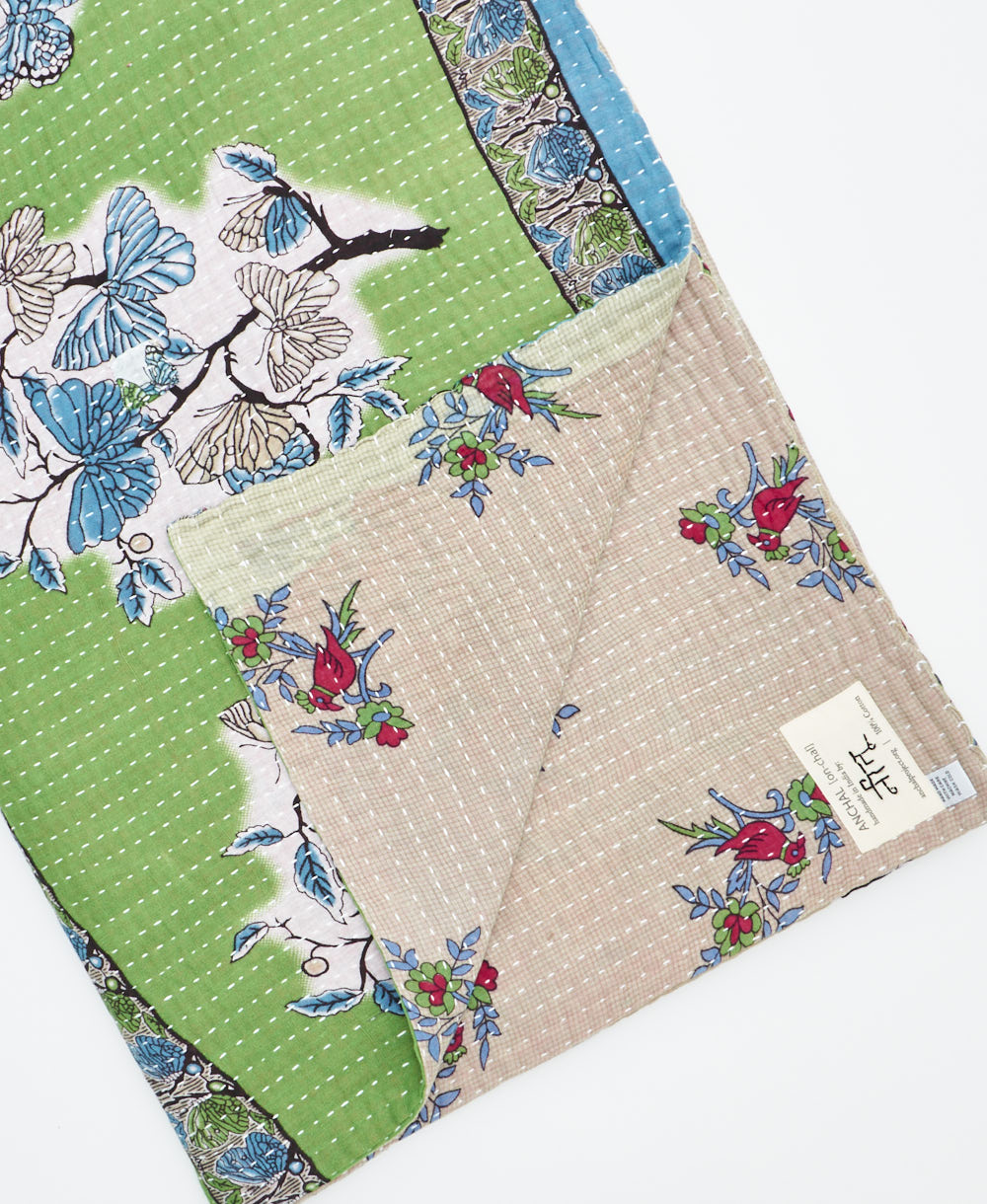 Kantha quilt throw featuring traditional kantha hand stitching