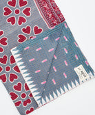 Kantha quilt throw featuring traditional kantha hand stitching
