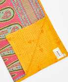 Kantha quilt throw featuring traditional kantha hand stitching