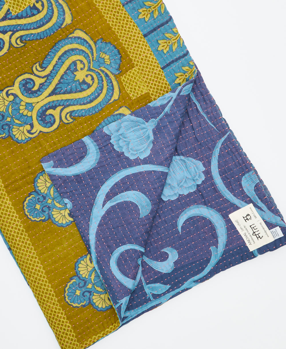 Kantha quilt throw featuring traditional kantha hand stitching