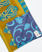 Kantha quilt throw featuring traditional kantha hand stitching
