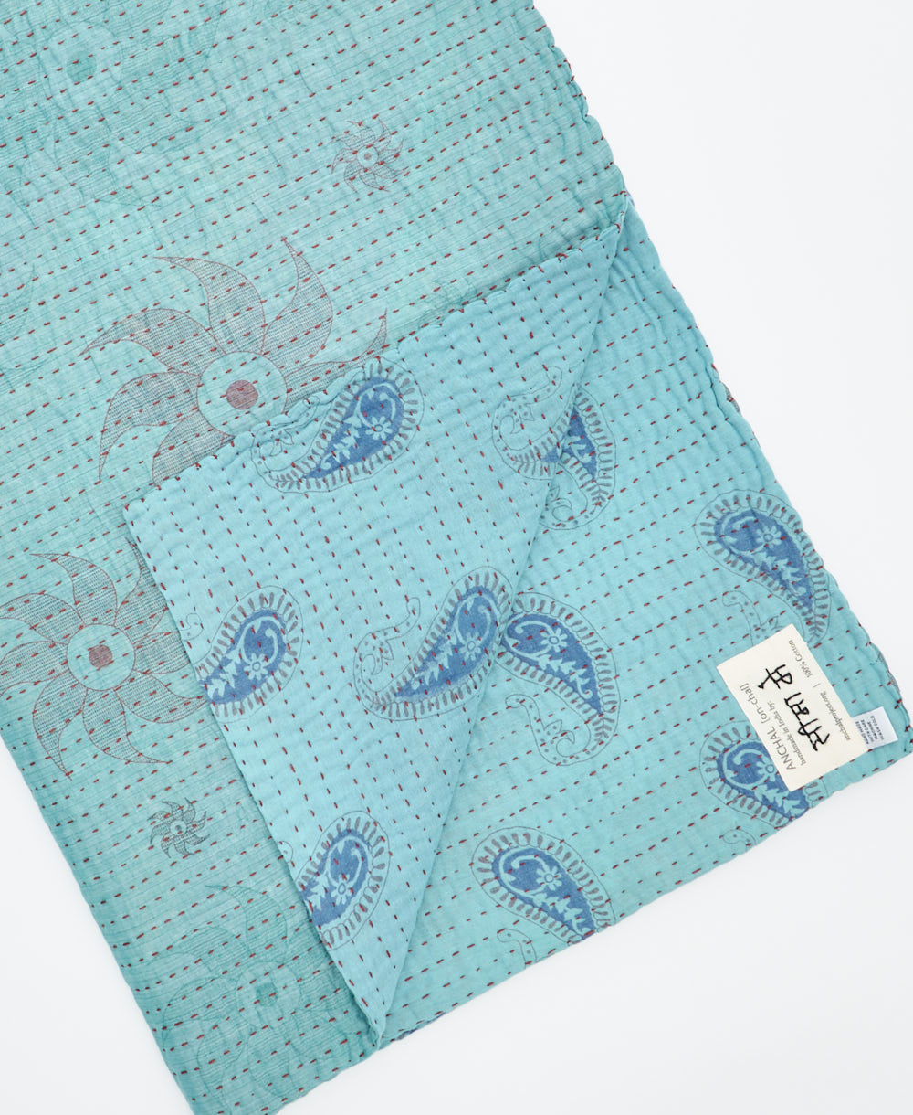Kantha quilt throw featuring traditional kantha hand stitching