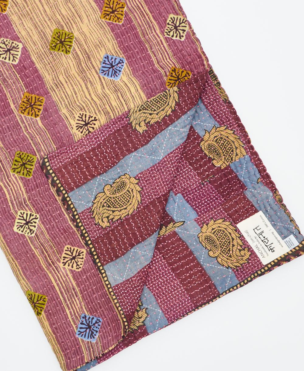 Kantha quilt throw featuring traditional kantha hand stitching