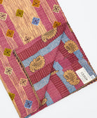 Kantha quilt throw featuring traditional kantha hand stitching