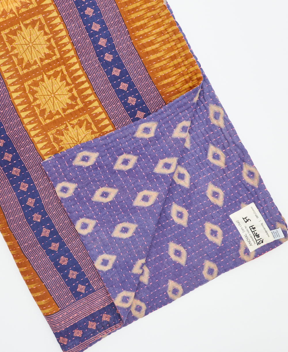 Kantha quilt throw featuring traditional kantha hand stitching