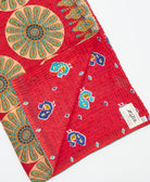 Kantha quilt throw featuring traditional kantha hand stitching