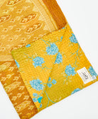 Kantha quilt throw featuring traditional kantha hand stitching
