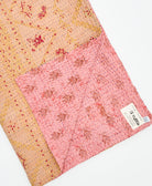 Kantha quilt throw featuring traditional kantha hand stitching