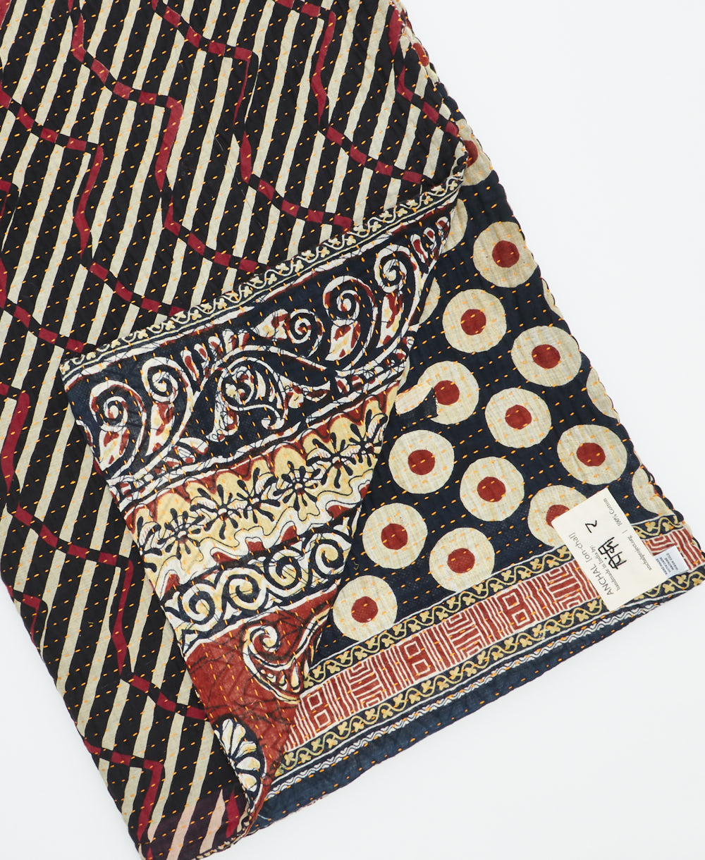 Kantha quilt throw featuring traditional kantha hand stitching
