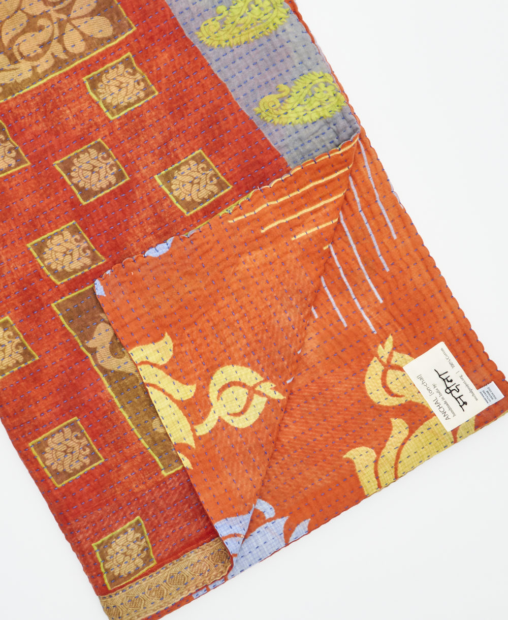 Kantha quilt throw featuring traditional kantha hand stitching
