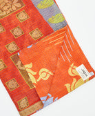 Kantha quilt throw featuring traditional kantha hand stitching