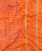 kantha quilt throw with a tag featuring the hand-stitched signature of the maker