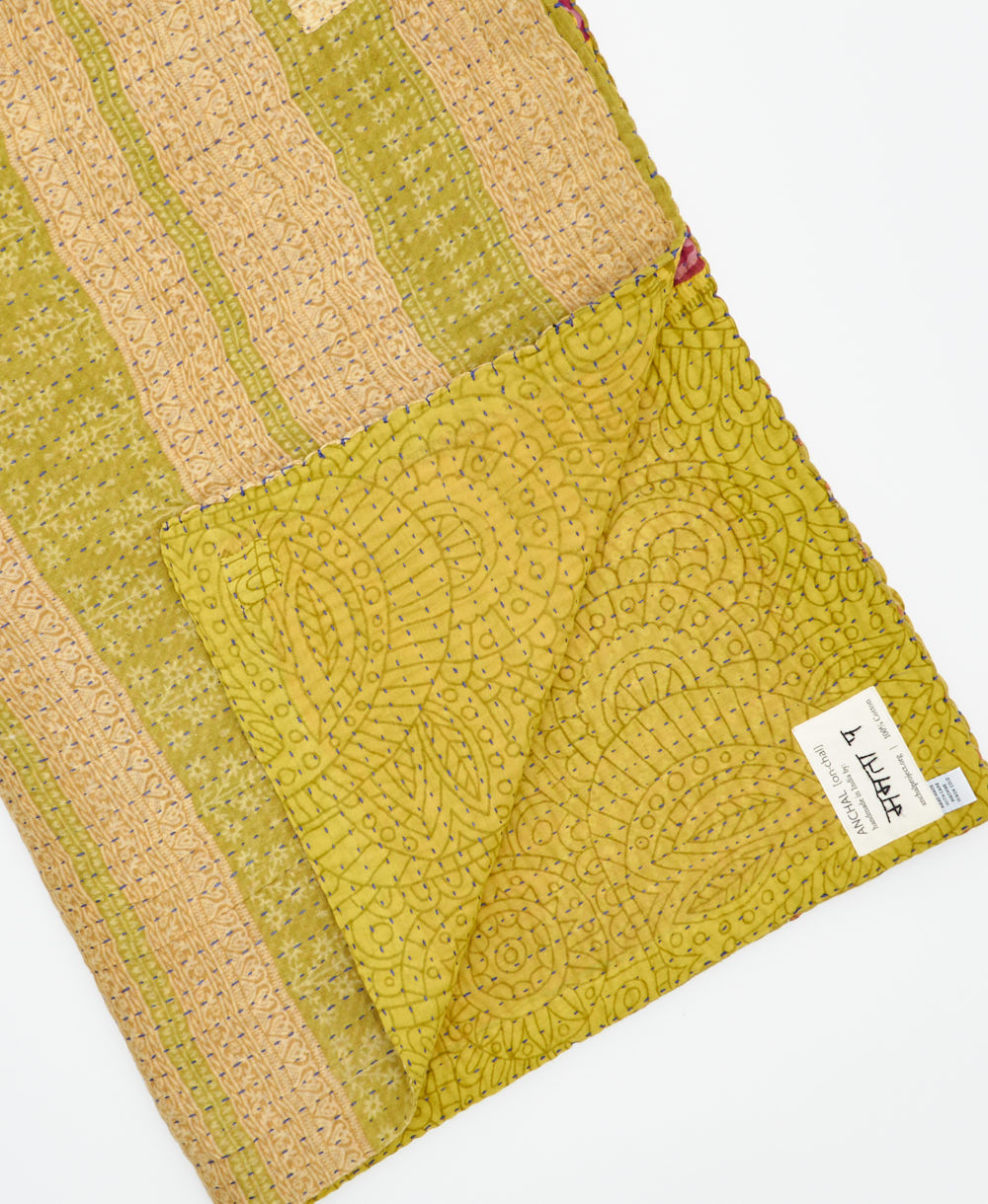 Kantha quilt throw featuring traditional kantha hand stitching