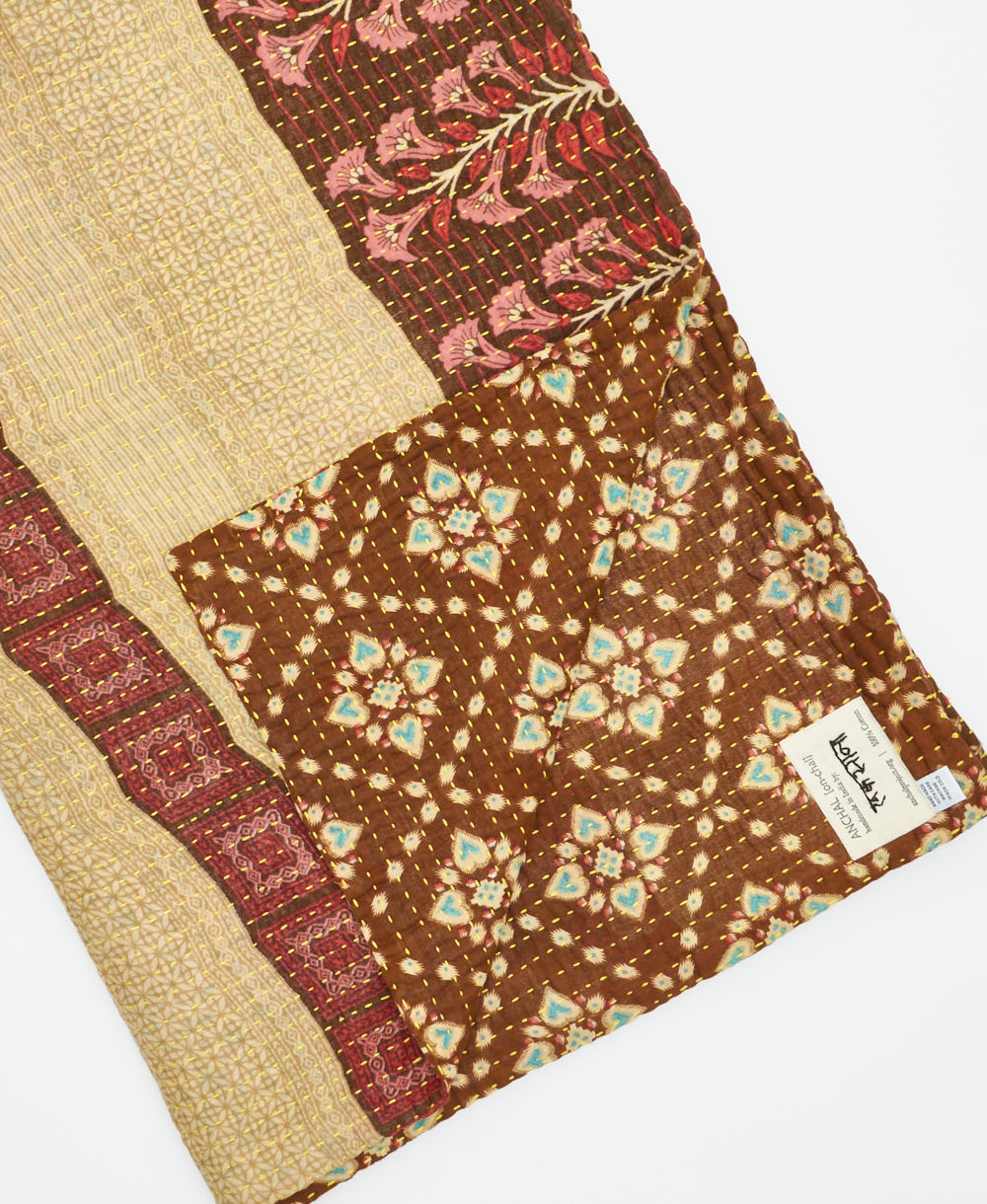 Kantha quilt throw featuring traditional kantha hand stitching