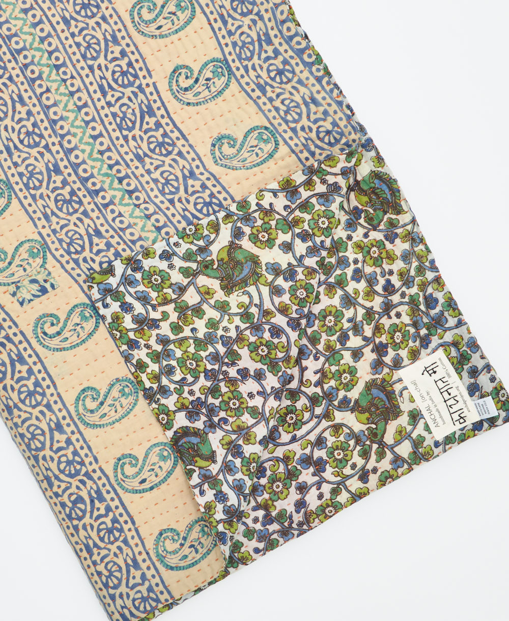 Kantha quilt throw featuring traditional kantha hand stitching
