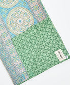 Kantha quilt throw featuring traditional kantha hand stitching