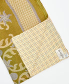 Kantha quilt throw featuring traditional kantha hand stitching