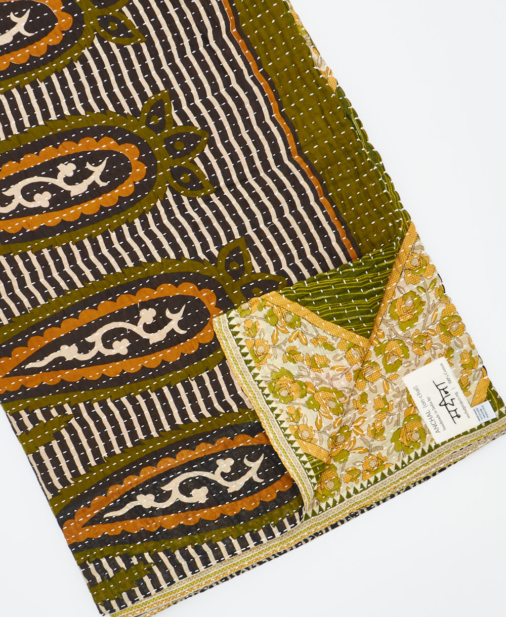 Kantha quilt throw featuring traditional kantha hand stitching