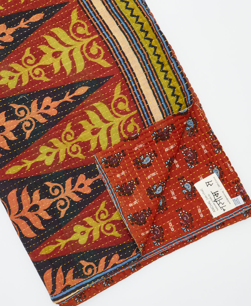 Kantha quilt throw featuring traditional kantha hand stitching