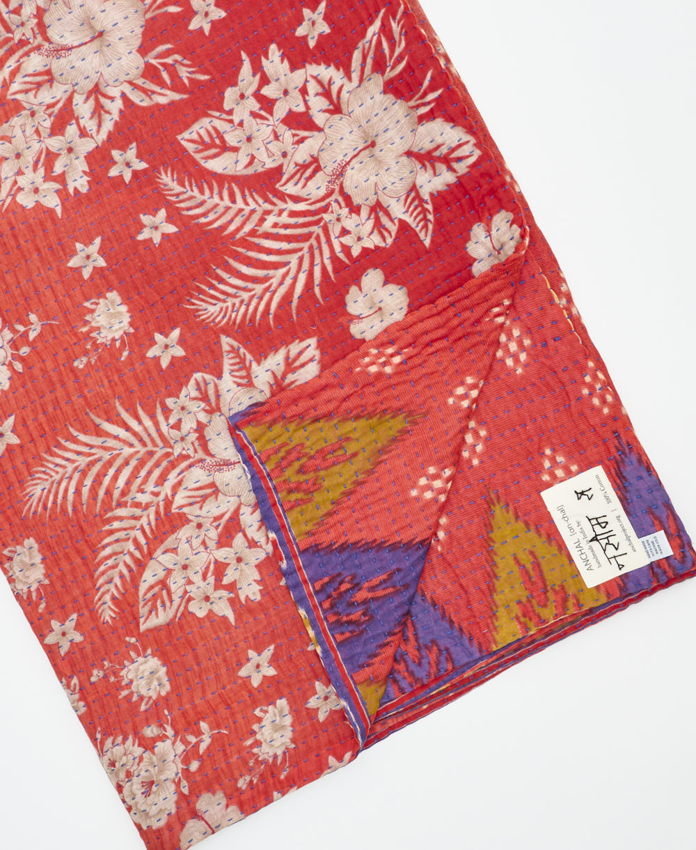 Kantha quilt throw featuring traditional kantha hand stitching