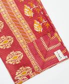Kantha quilt throw featuring traditional kantha hand stitching