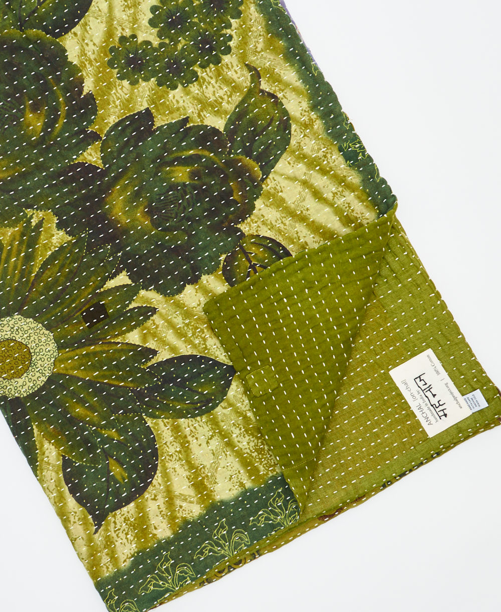 Kantha quilt throw featuring traditional kantha hand stitching