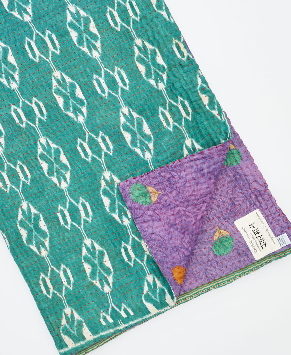 Kantha quilt throw featuring traditional kantha hand stitching