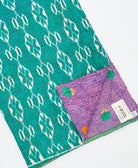 Kantha quilt throw featuring traditional kantha hand stitching