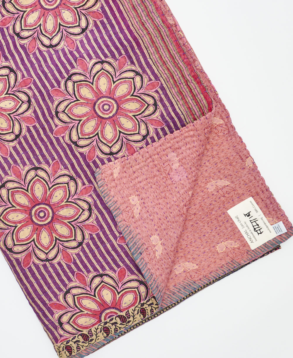 Kantha quilt throw featuring traditional kantha hand stitching