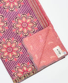 Kantha quilt throw featuring traditional kantha hand stitching
