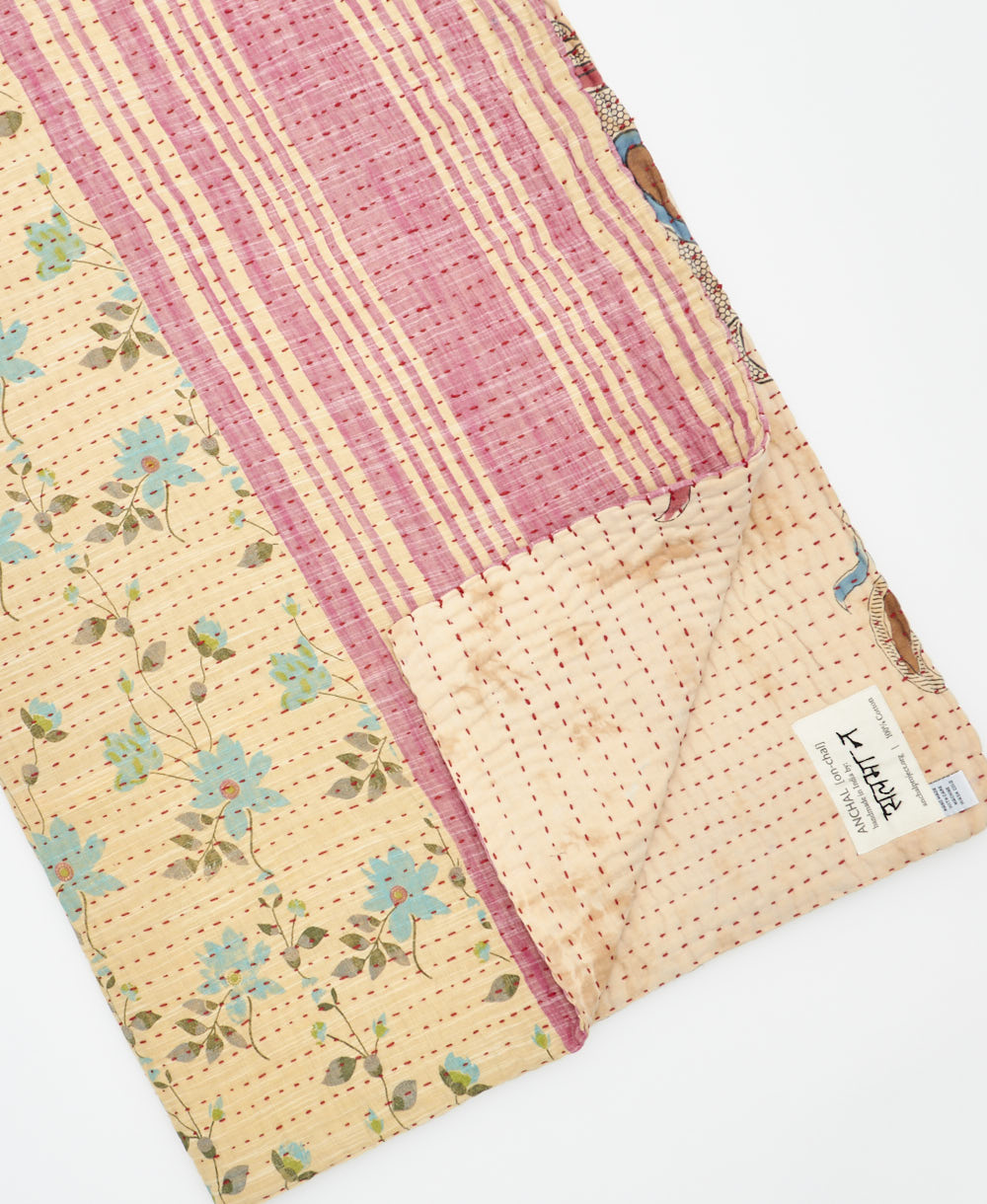 Kantha quilt throw featuring traditional kantha hand stitching