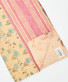 Kantha quilt throw featuring traditional kantha hand stitching