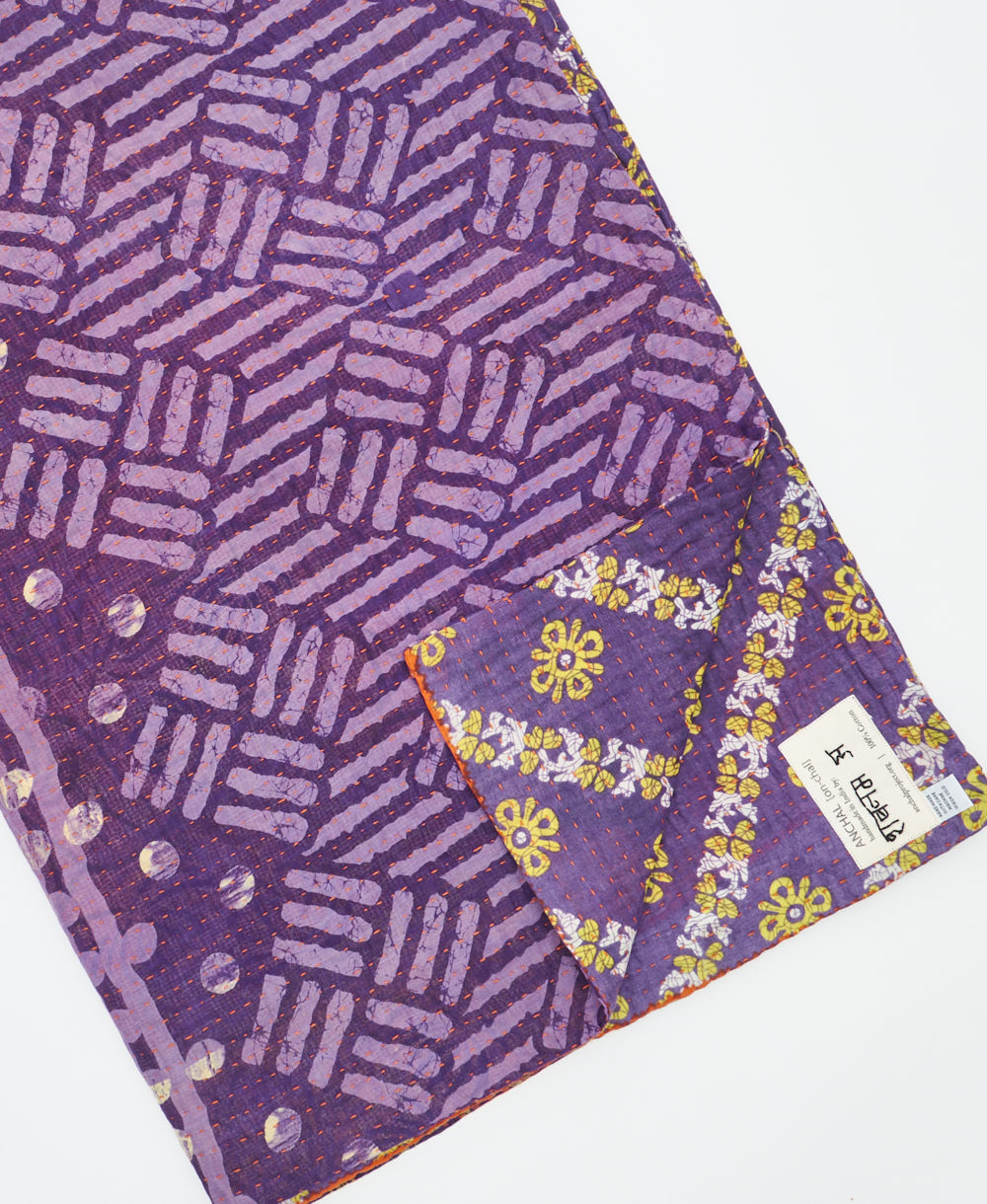 Kantha quilt throw featuring traditional kantha hand stitching