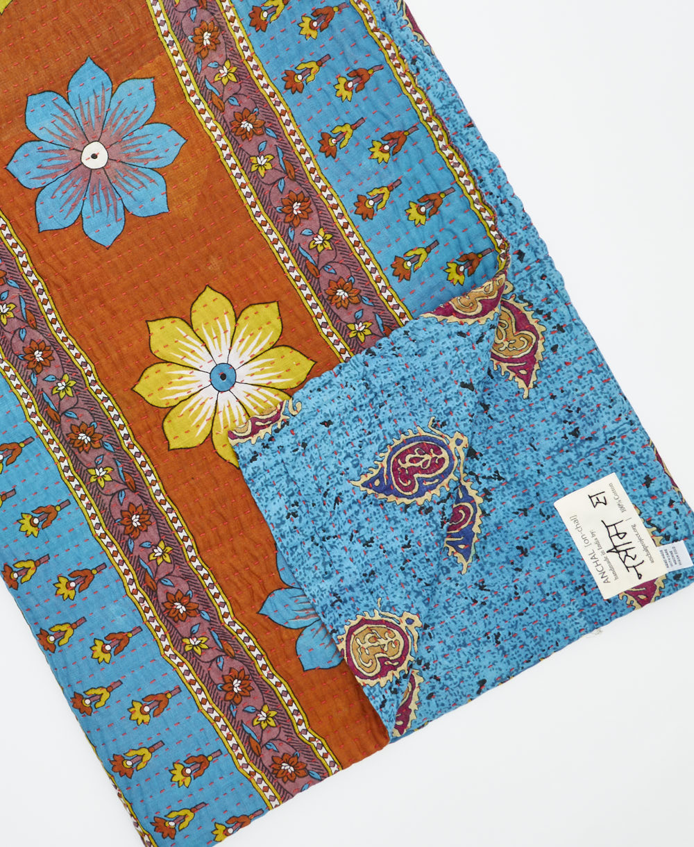 Kantha quilt throw featuring traditional kantha hand stitching