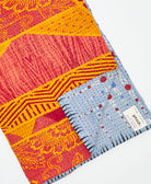 Kantha quilt throw featuring traditional kantha hand stitching