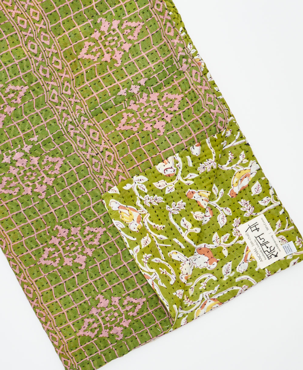 Kantha quilt throw featuring traditional kantha hand stitching