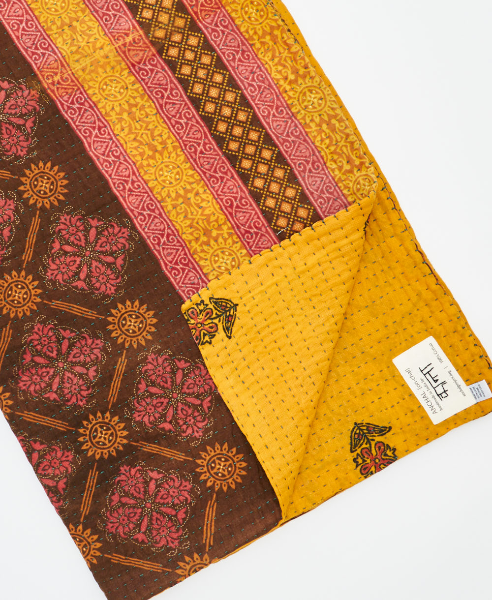 Kantha quilt throw featuring traditional kantha hand stitching