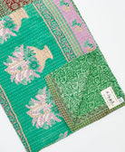 Kantha quilt throw featuring traditional kantha hand stitching