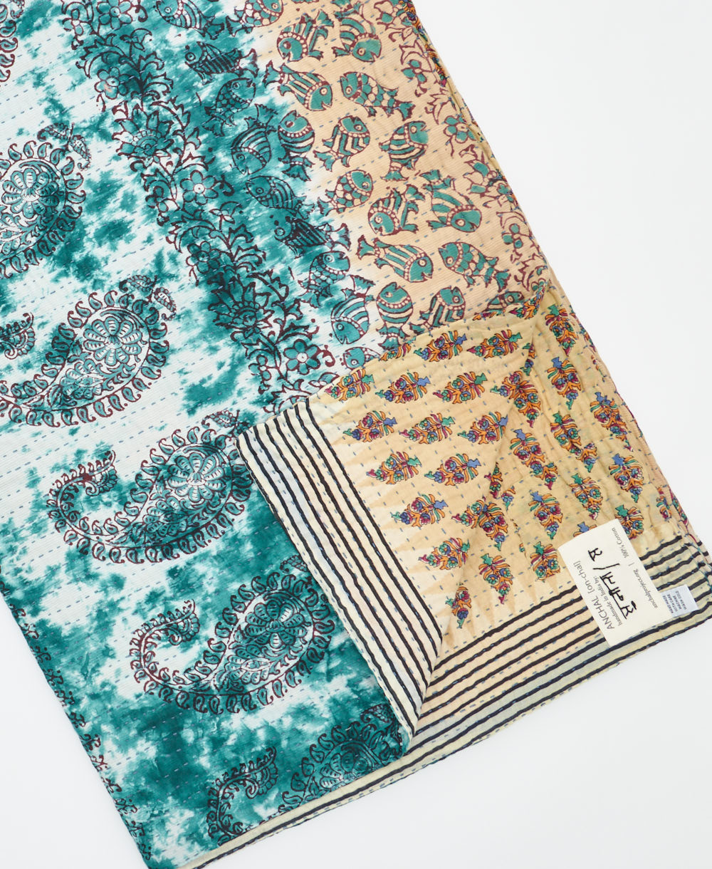 Kantha quilt throw featuring traditional kantha hand stitching
