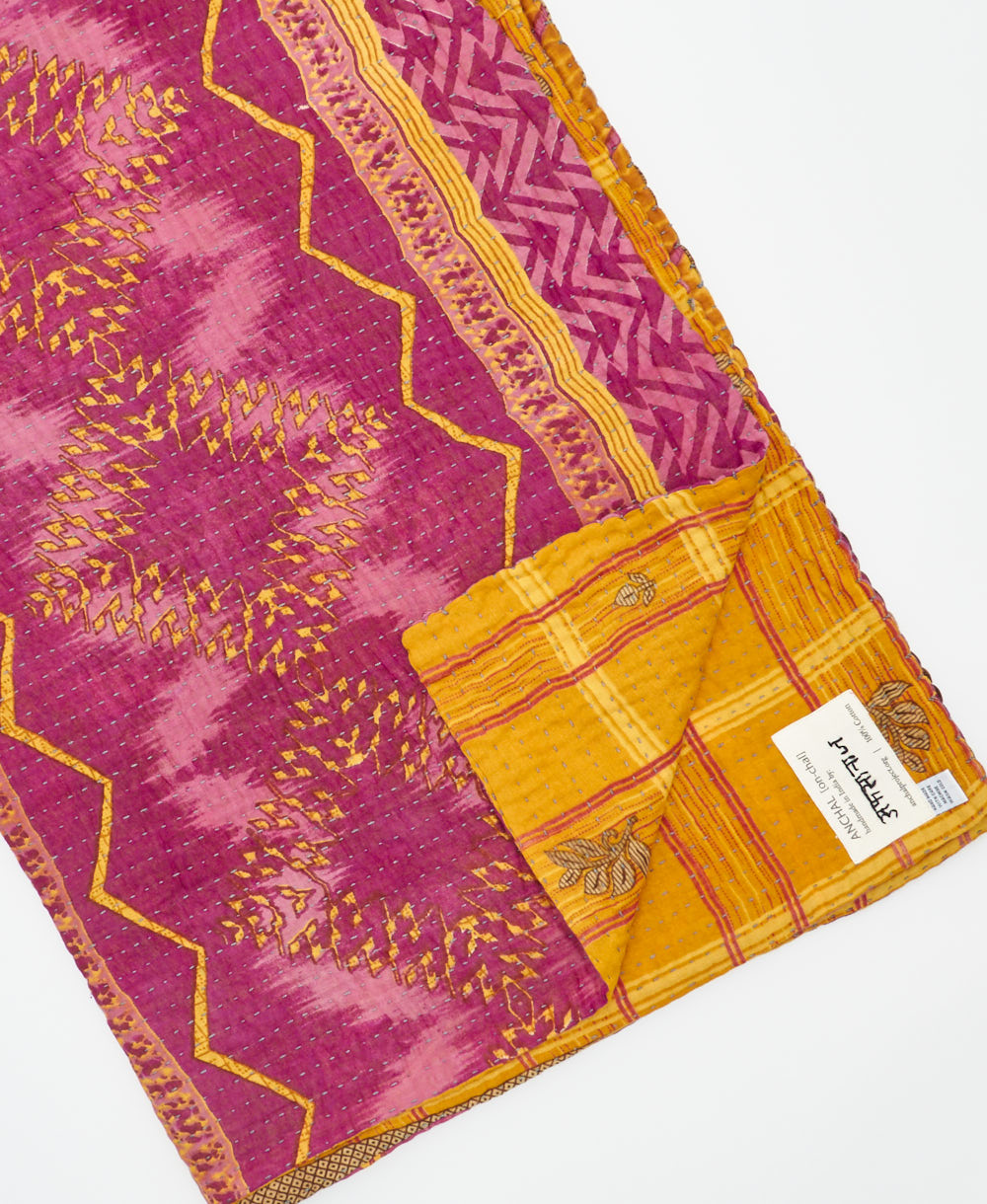 Kantha quilt throw featuring traditional kantha hand stitching