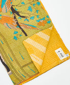 Kantha quilt throw featuring traditional kantha hand stitching