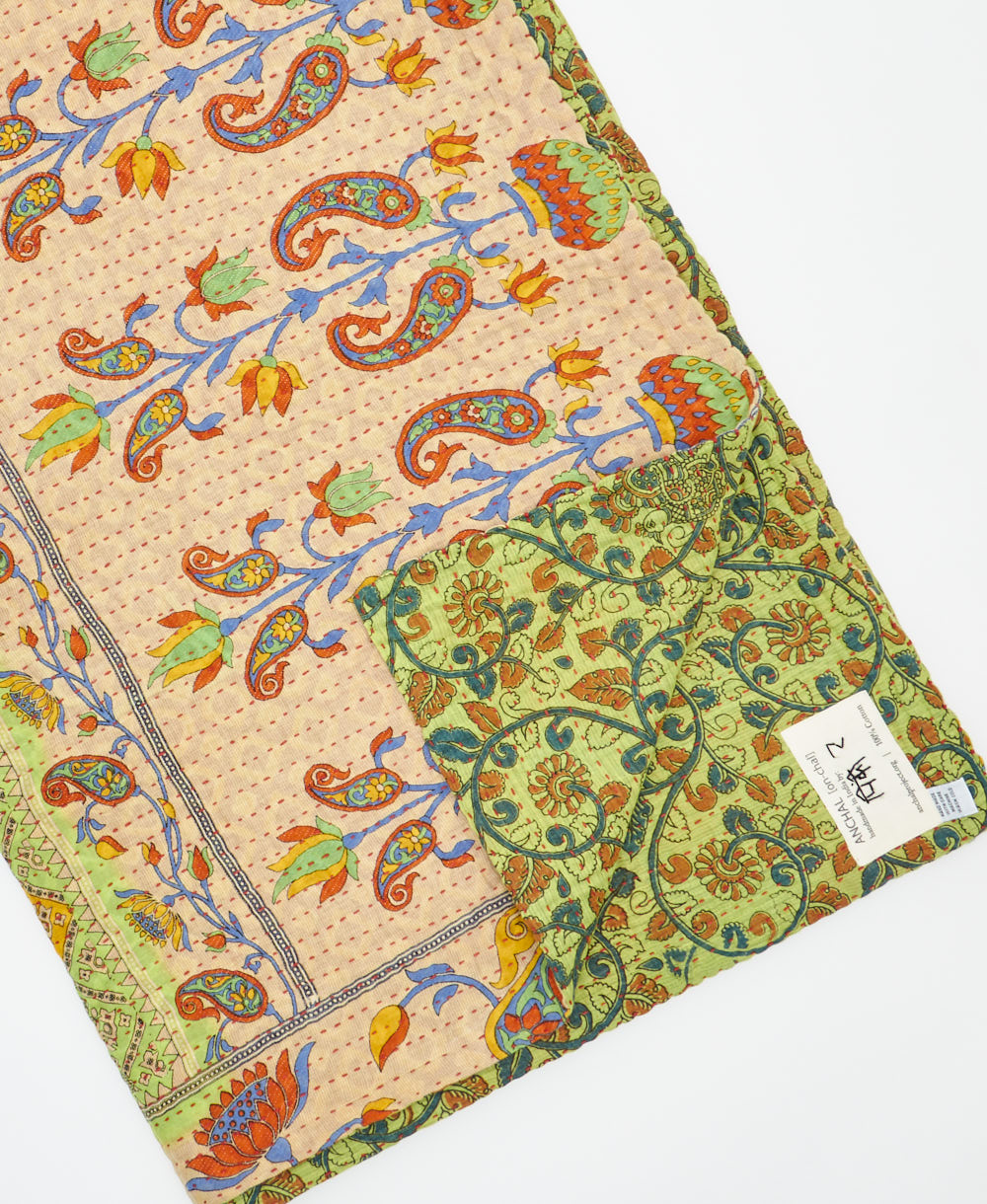 Kantha quilt throw featuring traditional kantha hand stitching